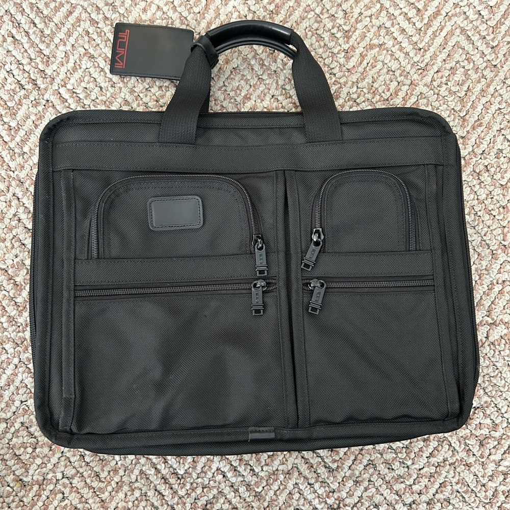 TUMI Alpha Expandable black nylon messenger travel laptop carry on bag